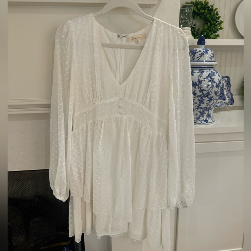 white long sleeved flowy dress